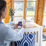 ABUS BRIDGE One mit Smartphone und ABUS One App